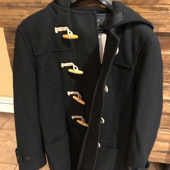Never worn, warm and comfortable black peacoat for sale. - Picture 3 of 3